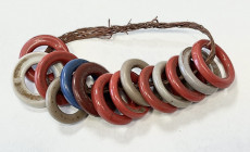 PAPUA NEW GUINEA: woven bracelet, made from native fiber, used as a decoration many years ago, before the natives realized that these plastic like rin...