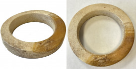 SOLOMON ISLANDS: bakiha shell ring, 107mm / 4" in diameter with yellow section on 1/3 of the surface, used as chief's money on New Georgia Island, Wes...