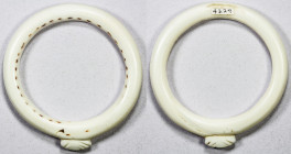 SOLOMON ISLANDS: cone shell ring, 74mm, shell ring with 2 3/4" diameter decorative relief on outer edge, VF, ex Charles Opitz Collection. 
Estimate: ...