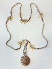SOLOMON ISLANDS: shell & teeth money (25.28g), ca. 50cm, consisting of numerous small shell discs and five groups of ten porpoise teeth, all strung to...
