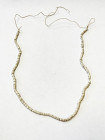 SOLOMON ISLANDS: shell money (5.31g), 37cm, consisting of numerous small white shell discs on a string, VF, ex Charles Opitz Collection. 
Estimate: U...