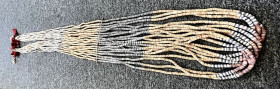 SOLOMON ISLANDS: tafuliae' shell money, Opitz pg. 330 (plate), 292cm (115") in length, large tafuliae' from the Malaita Island, shells with wooden div...