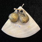 TAIWAN: horn plate money (9.73g), 39 x 33mm, fan-shaped section of water buffalo horn, attached to two small brass jingle bells and tiny black beads, ...