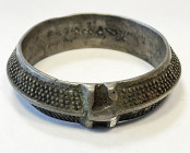 THAILAND: base silver bracelet (139g), 72 x 18mm, diamond-shaped exterior with dotted decoration, VF, ex Charles Opitz Collection. 
Estimate: USD 50 ...