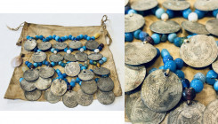 TURKEY: coin cloth, 175mm, cloth sewn with 24 coins, trade beads and a single shell, pierced coins are all from Sultan Mahmud II, 1½ kurush billon coi...
