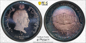JORDAN: Hussain Ibn Talal, 1952-1999, AR 1/2 dinar, 1969/AH1389, KM-21, al-Harraneh Palace, lovely iridescent toning! PCGS graded Proof 67 DCAM.
Esti...