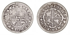 Monarquía Española
Felipe V
2 Reales. AR. Cuenca JJ. 1717. Falsa de época. 3.62g. Barrera No cat. Escasa. (BC).