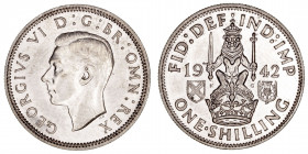 Monedas Extranjeras
Gran Bretaña Jorge VI
Shilling. AR. 1942. 5.68g. KM.854. Conserva restos de brillo original. EBC+.