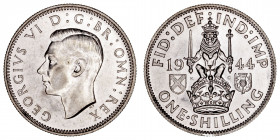 Monedas Extranjeras
Gran Bretaña Jorge VI
Shilling. AR. 1944. 5.67g. KM.854. Conserva brillo. SC-.