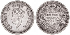 Monedas Extranjeras
India Británica Jorge VI
1/2 Rupia. AR. 1942. 5.81g. KM.551. MBC.