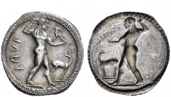 Greek Coins 
 Bruttium, Caulonia 
 Nomos circa 525-500, AR 7.95 g. KAVL Apollo, diademed, walking r., holding laurel branch in upraised r. hand and ...