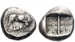 Greek Coins 
 Islands off Epirus. Corcyra 
 Stater circa 500-450, AR 11.20 g. Cow standing r., looking back at suckling calf crouching l. below. Rev...