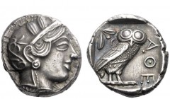Greek Coins 
 Attica, Athens 
 Tetradrachm circa 415-407, AR 17.17 g. Head of Athena r., wearing crested Athenian helmet and disc earring. Rev. ΑΘΕ ...