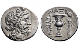 Greek Coins 
 The Cyclades. Naxos 
 Didrachm circa 200-150, AR 7.81 g. Ivy-wreathed head of Dionysus r. Rev. NAXI – TYNNI Wreathed crater; to r., th...