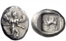 Greek Coins 
 Caria, Caunus 
 Drachm circa 490-470, AR 5.91 g. Winged Iris, with outstretched hand, kneeling-running r., head turned back; two scrol...