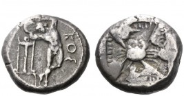 Greek Coins 
 Islands off Caria, Cos 
 Triple siglos circa 470, AR 16.44 g. KOS Naked discobolos, his body inclined to l., about to throw the discus...