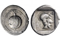 Greek Coins 
 Side 
 Stater circa 400, AR 10.82 g. Pomegranate. Rev. Head of Athena r., wearing crested Corinthian helmet; above, to r., olive sprig...