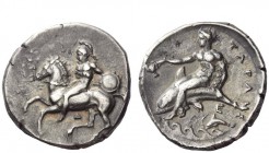 Greek Coins 
 Calabria, Tarentum 
 Nomos circa 344-340, AR 7.88 g. Rider l., holding spear and shield, dismounting from horse. Rev. Dolphin rider l....