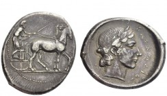 Greek Coins 
 Sicily, Catana 
 Tetradrachm unsigned work by Kra circa 430-425, AR 17.13 g. Slow quadriga driven r. by charioteer, holding kentron an...