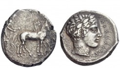 Greek Coins 
 Sicily, Catana 
 Tetradrachm circa 425-420, AR 16.46 g. Slow quadriga driven r. by charioteer, holding kentron and reins. Rev. Laureat...
