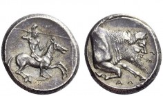 Greek Coins 
 Gela 
 Didrachm circa 490-475, AR 8.75 g. Horseman r., hurling javelin. Rev. Forepart of man-headed bull swimming r.; below, legend. S...