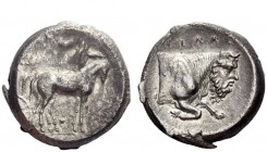 Greek Coins 
 Gela 
 Sicily, Gela Tetradrachm 420-415, AR, 16.47 g. Slow quadriga driven r. by charioteer; above, Nike flying l. to crown him. Rev. ...