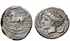Greek Coins 
 Syracuse 
 Tetradrachm signed by Eumenos circa 415-405, AR 17.35 g. Fast quadriga driven l. by charioteer, holding kentron and reins; ...