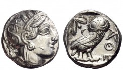 Greek Coins 
 Attica, Athens 
 Tetradrachm circa 403-365, AR 17.08 g. Head of Athena r., wearing crested helmet, earring and necklace; bowl ornament...