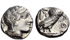 Greek Coins 
 Attica, Athens 
 Tetradrachm circa 403-365, AR 17.15 g. Head of Athena r., wearing crested helmet, earring and necklace; bowl ornament...