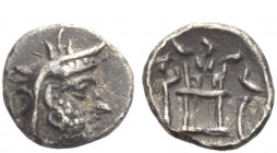 Greek Coins 
 Darius I, 2nd century BC 
 Obol, Persepolis 2nd century BC, AR 0.62 g. Diademed head r. wearing kyrbasia . Rev. Fire temple; in l. fie...