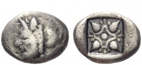 Greek Coins 
 Cyrenaica, Cyrene 
 Drachm circa 495-475, AR 4.05 g. Head of man-headed bull l.; behind, silphium fruit. Rev. Four lotus buds set in s...