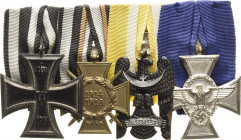 Ordensspangen
Spange mit 4 Auszeichnungen Preußen - Eisernes Kreuz 1914 2. Klasse. Drittes Reich - Ehrenkreuz für Frontkämpfer mit Schwertern. Deutsc...