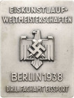 Sportmedaillen
Eiskunstlauf Einseitige Weißmetallplakette 1938 (Rob. Neff, Berlin) Weltmeisterschaften in Berlin. Reichsadler zwischen 4 Zeilen Schri...