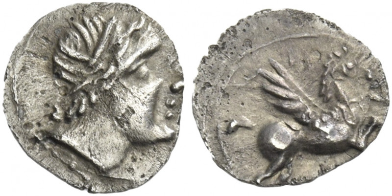 Greek Coins. Emporion. 
Tetartemorion after 241, AR 0.15 g. Diademed head r. Re...