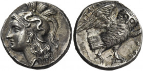 Greek Coins. Calabria, Tarentum. 
Drachm circa 280-272, AR 3.11 g. Head of Athena, wearing crested Attic helmet, bowl decorated with Scylla hurling s...
