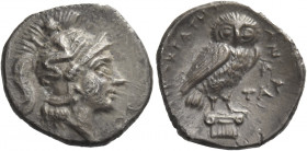 Greek Coins. Calabria, Tarentum. 
Drachm circa 272-240, AR 2.96 g. Head of Athena r., wearing crested Attic helmet, bowl decorated with Scylla r., hu...
