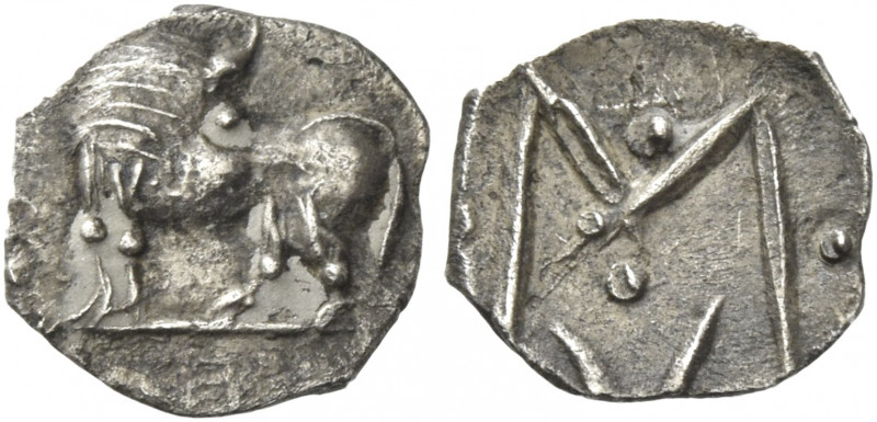 Greek Coins. Sybaris. 
Obol circa 550-510, AR 0.40 g. Bull standing l., head tu...