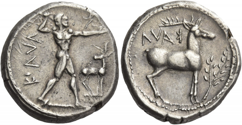 Greek Coins. Caulonia. 
Nomos circa 450-445, AR 8.13 g. KAVΛ Apollo walking r.,...