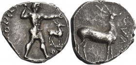 Greek Coins. Caulonia. 
Nomos circa 425-420, AR 7.90 g. [ΚΑΥΛΟΝ]ΣΑΤΑΝ Apollo walking r., holding laurel branch and extending l. arm; in r. field, sta...