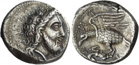 Greek Coins. Locri. 
Nomos circa 320-280, AR 7.57 g. Laureate head of Zeus r.; behind, thunderbolt. Rev. Λ[OKP]ΩN retrograde Eagle flying l. with dea...