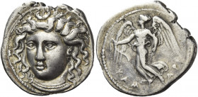 Greek Coins. Camarina. 
Drachm circa 415-405, AR 4.09 g. Bust of the nymph Camarina, facing three-quarters l., hair flying behind in loose curls, wea...