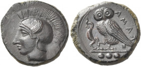 Greek Coins. Camarina. 
Tetras circa 410-405, Æ 3.35 g. Helmeted head of Athena l. Rev. KAMA retrograde Owl standing l., with closed wings, holding l...
