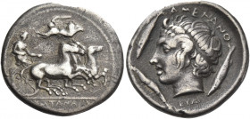 Greek Coins. Catana.
Dracm signed by Euainetos circa 405, AR 3.65 g. KATANAIΩ[N] Fast quadriga driven r. by charioteer, holding kentron and reins; ab...