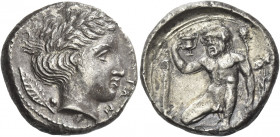 Greek Coins. Naxos. 
Didrachm circa 430-415, AR 7.81 g. [NAΞ]IΩN Laureate head of Apollo r.; behind, laurel leaf with berry. Rev. Squatting naked Sil...