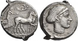 Greek Coins. Syracuse. 
Tetradrachm circa 430-420, AR 17.37 g. Slow quadriga driven r. by charioteer; above Nike flying r. and crowning horses. Rev. ...