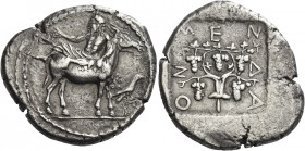 Greek Coins. Mende. 
Tetradrachm circa 460-425, AR 17.19 g. Elderly Dionysus, wearing ivy wreath and himation, reclining on mule's back l., holding c...