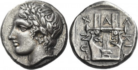 Greek Coins. Olynthus. 
Chalcidian league. Tetradrachm circa 412-410, AR 13.75 g. Laureate head of Apollo l. Rev. Χ – Α – Λ – ΚΙΔ – Ε – ΩN Cithara wi...