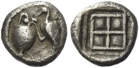 Greek Coins. Terone. 
Tritartemorion late V century BC, AR 0.32 g. Crane standing l., putting its beak in an oinochoe. Rev. Quadripartite incuse squa...
