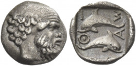 Greek Coins. Islands off Thrace, Thasos. 
Tritartemorion circa 412-404, AR 0.44 g. Head of satyr r. Rev. Θ – A – Σ – I Two dolphins swimming in oppos...