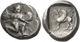 Greek Coins. Caunus. 
Triobol circa 490-470, AR 2.60 g. Winged female figure in kneeling-running stance to r., head turned back. Rev. Griffin standin...